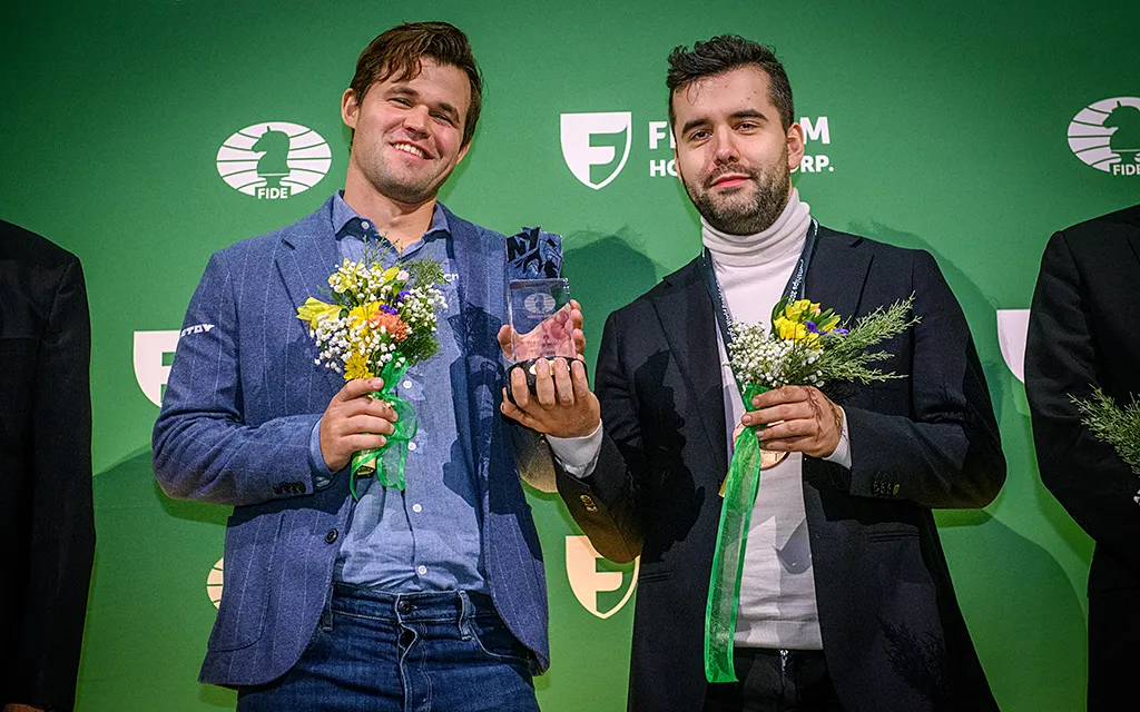 Магнус_Карлсен,_Ян_Непомнящий,_FIDE5.webp